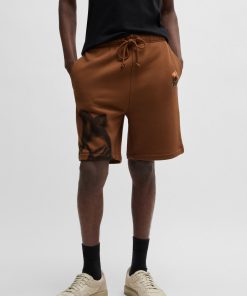 Hugo Boss-Relaxed-fit shorts with floral artwork-hugoboss