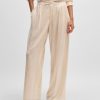 Hugo Boss-Loose-fit wide-leg trousers in faux leather-boss near me 4