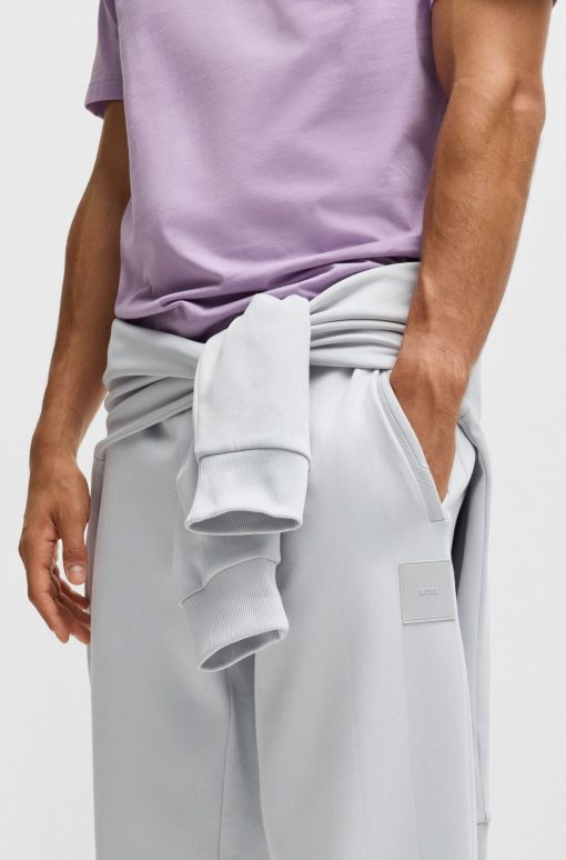 Hugo Boss Sweatshirts and Jogging Pants-Tracksuit bottoms in a drop-needle cotton-hugo boss outlet - Image 2