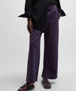 Hugo Boss-NAOMI x BOSS tracksuit bottoms with leopard print-hugo boss near me