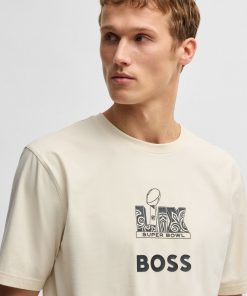 Hugo Boss T-Shirts-BOSS x NFL stretch-cotton T-shirt with gold-tone artwork-hugo boss near me 2