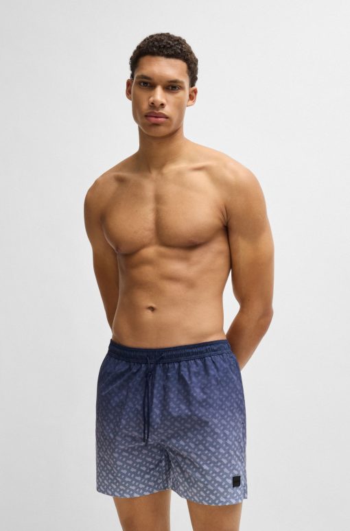 Hugo Boss Swimwear-Logo-badge swim shorts with degradé monogram print-hugo boss store near me