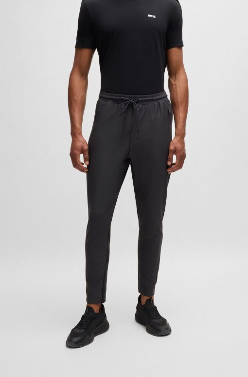 Hugo Boss Sweatshirts and Jogging Pants-Active-stretch tracksuit bottoms with decorative reflective details-boss store near me