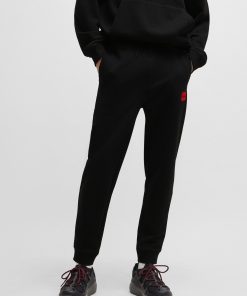 Hugo Boss Sweatshirts and Jogging Pants-Cotton-terry tracksuit bottoms with red logo label-boss outlet