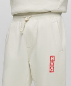 Hugo Boss Sweatshirts and Jogging Pants-Cotton-terry tracksuit bottoms with vertical logo-boss near me 2