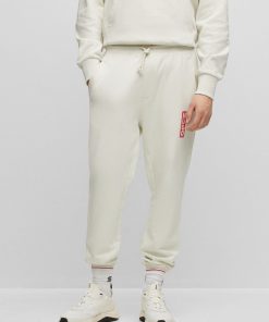 Hugo Boss Sweatshirts and Jogging Pants-Cotton-terry tracksuit bottoms with vertical logo-boss near me