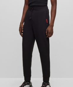 Hugo Boss Sweatshirts and Jogging Pants-Cotton-terry tracksuit bottoms with logo detail-boss store near me