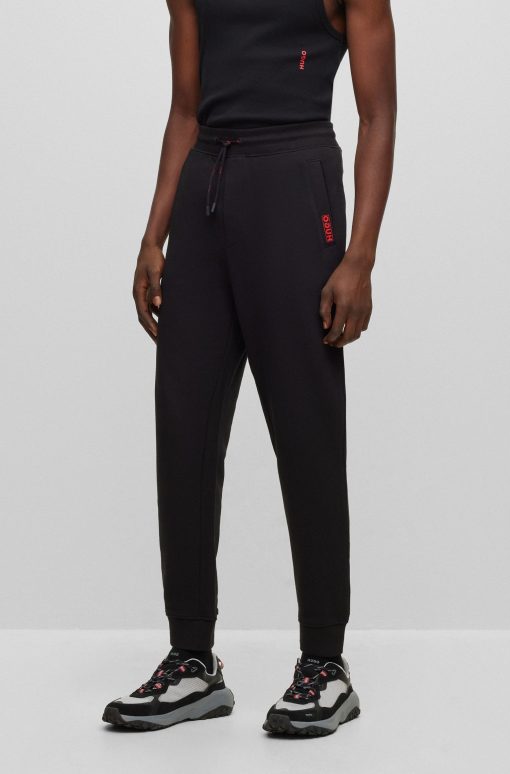 Hugo Boss Sweatshirts and Jogging Pants-Cotton-terry tracksuit bottoms with logo detail-boss store near me