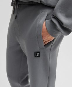 Hugo Boss Sweatshirts and Jogging Pants-Cotton tracksuit bottoms with stacked logo-hugo boss near me 2