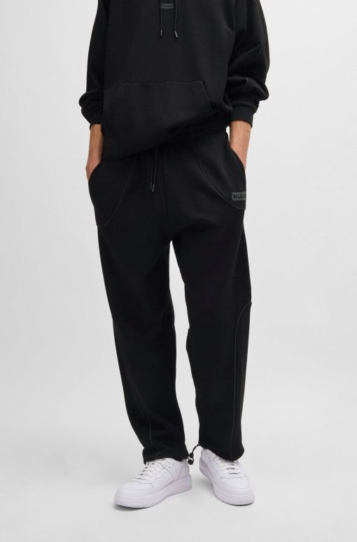 Hugo Boss Sweatshirts and Jogging Pants-Cotton-terry tracksuit bottoms with decorative reflective trims-hugo