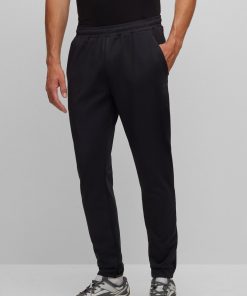 Hugo Boss Sweatshirts and Jogging Pants-Cuffed tracksuit bottoms in active-stretch fabric-hugo boss sale