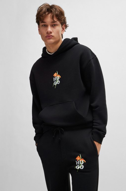 Hugo Boss Sweatshirts and Jogging Pants-Relaxed-fit tracksuit bottoms with floral logo artwork-boss store near me - Image 2