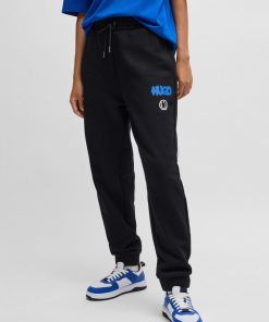 Hugo Boss Sweatshirts and Jogging Pants-Cotton-terry tracksuit bottoms with Happy HUGO logo-hugo by hugo boss 2