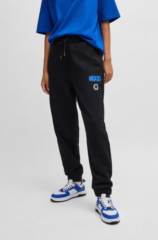 Hugo Boss Sweatshirts and Jogging Pants-Cotton-terry tracksuit bottoms with Happy HUGO logo-hugo by hugo boss - Image 2