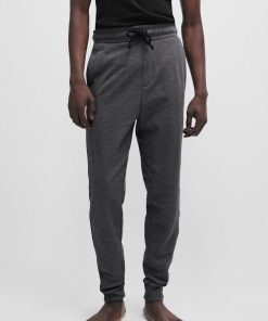 Hugo Boss Sweatshirts and Jogging Pants-Cuffed tracksuit bottoms in with logo tape-boss outlet